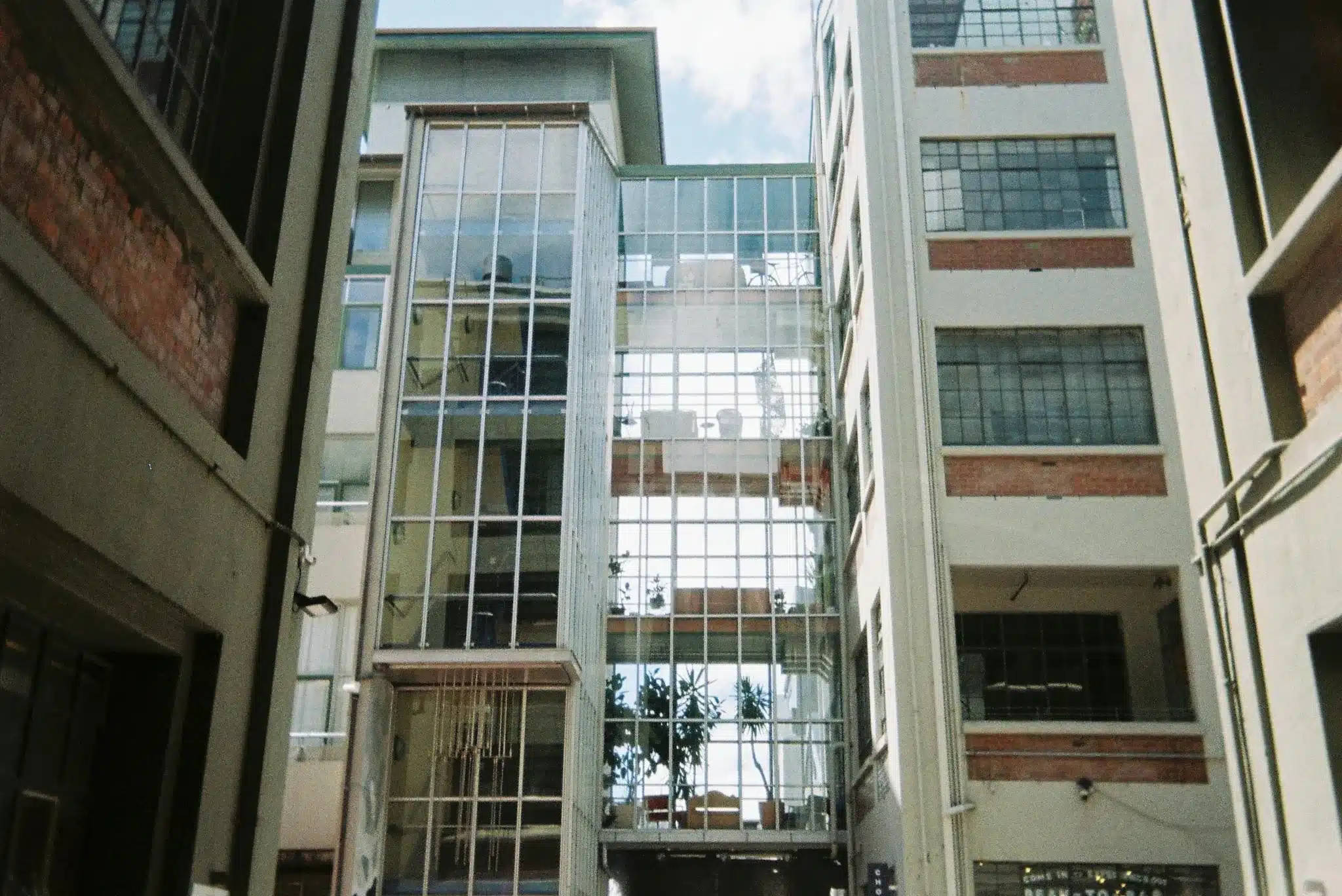 Modern urban architecture showcasing glass facades in Wellington, New Zealand.